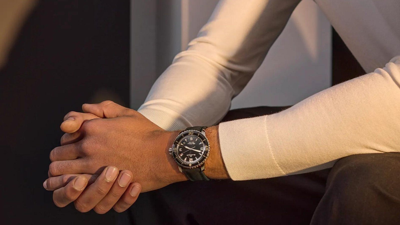 Customer wearing a premium LuxeChronos luxury watch with formal attire
